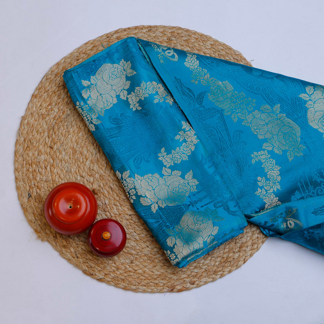 Cerulean Blue Satin Silk Fabric With Floral Jaal Pattern
