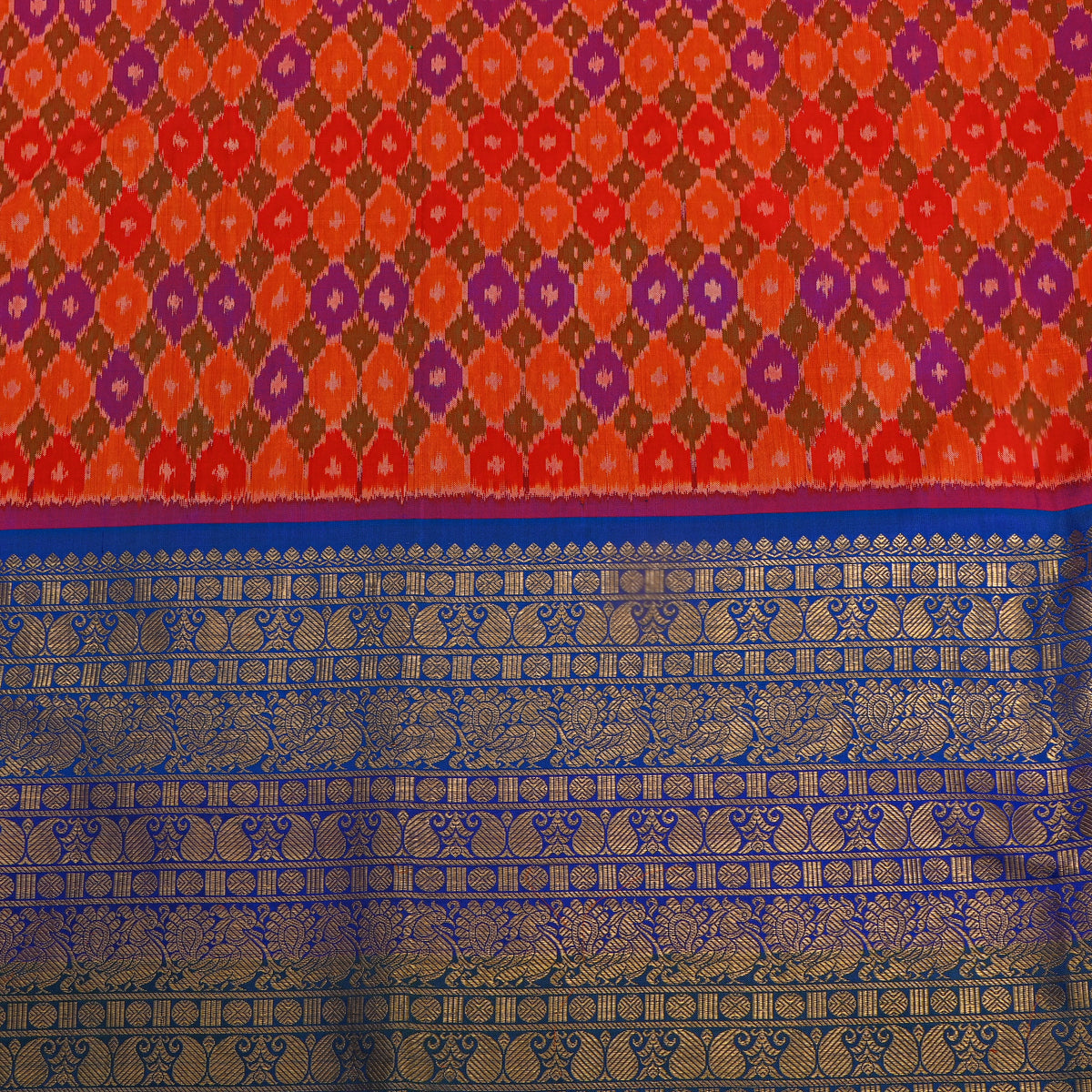 Marigold Ikat Silk Fabric With Blue Gold Zari Border