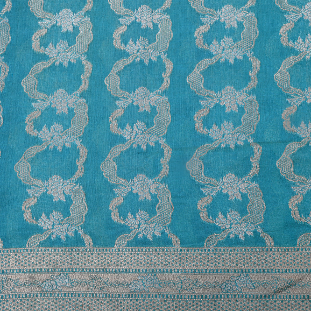 Sky Blue Banarasi Silk Fabric In Dual Tone Floral Zari