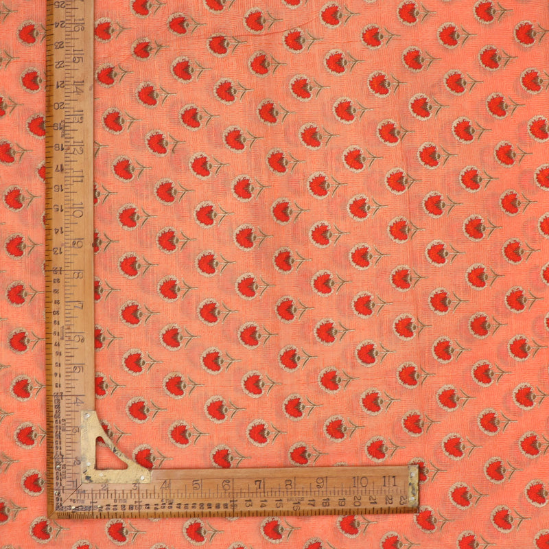 Peach Cotton Fabric With Printed Floral Patterns