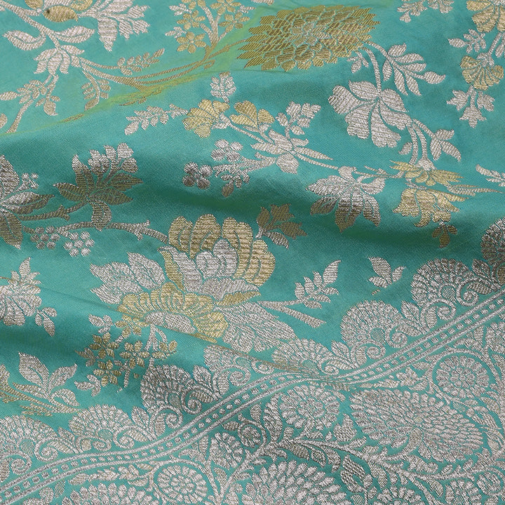 Turquoise Blue Banarasi Fabric With Floral Jaal Weaving & Border