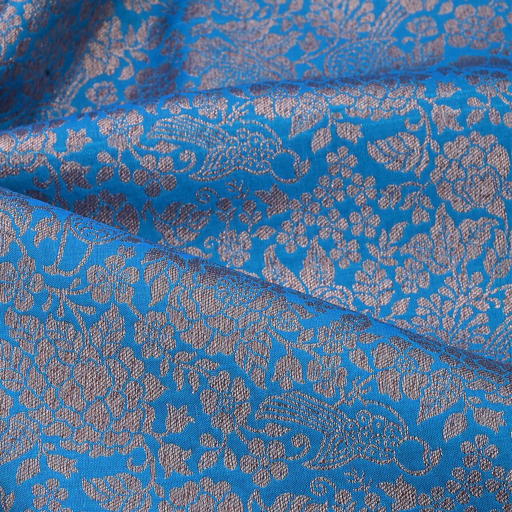 Capri Blue Banarasi Fabric With Floral Jaal Weaving