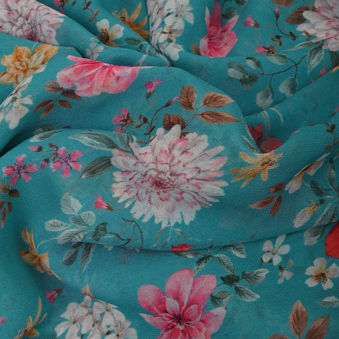 Bright Vivid Sky Blue Georgette Fabric With Floral Print