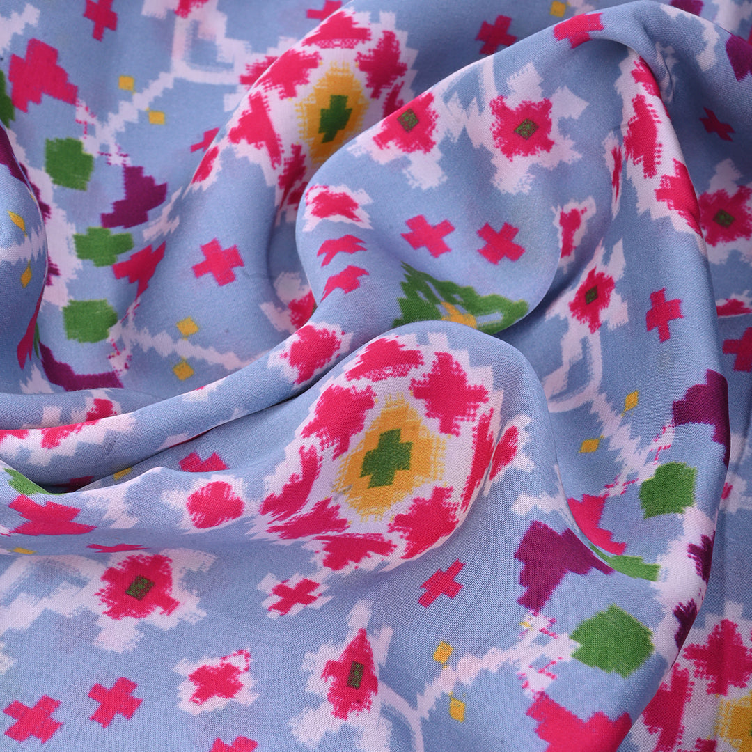 Pastel Sky Blue Printed Satin Fabric With Ikkat Patola Pattern