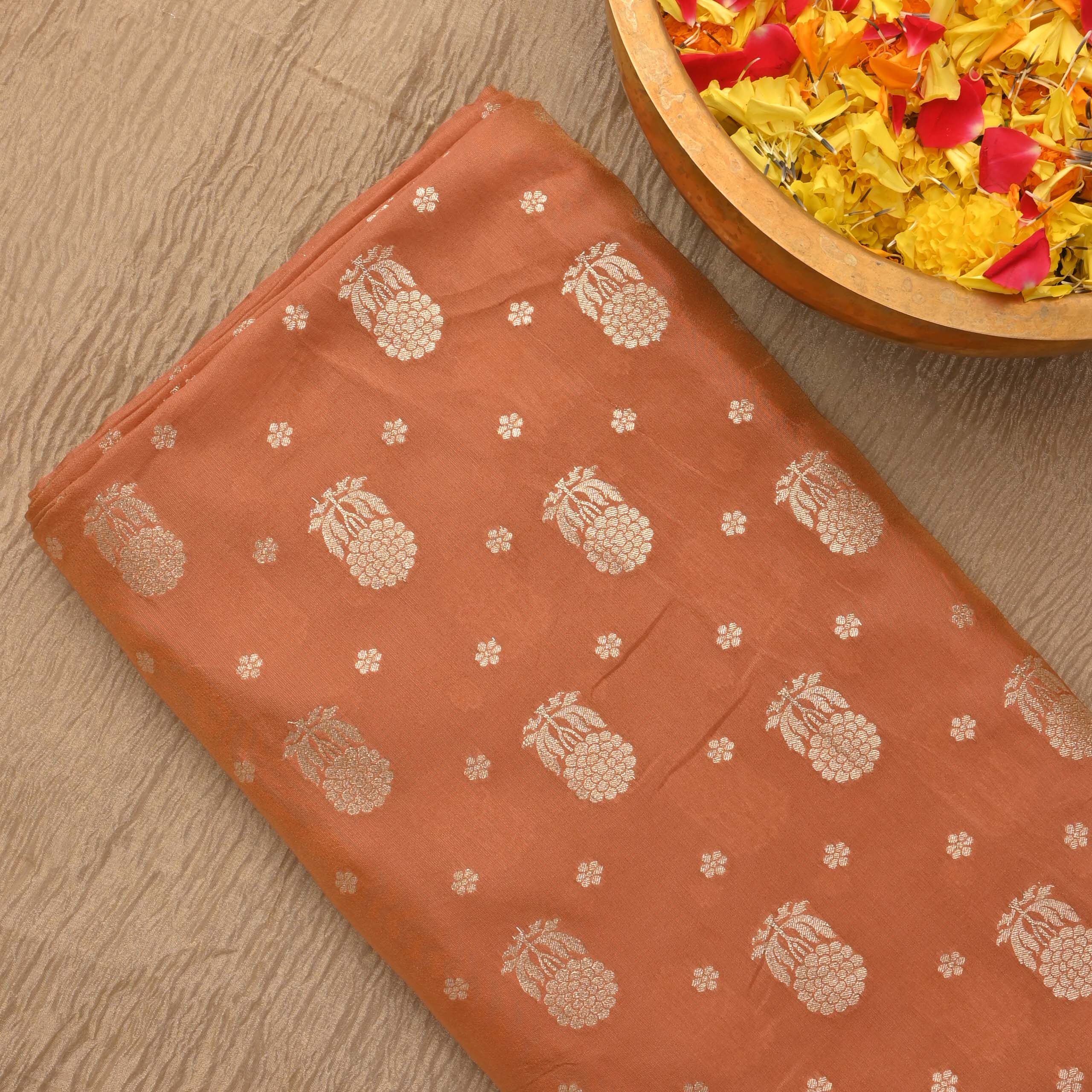 Dusty Orange Tissue Fabric With Zari Weaving