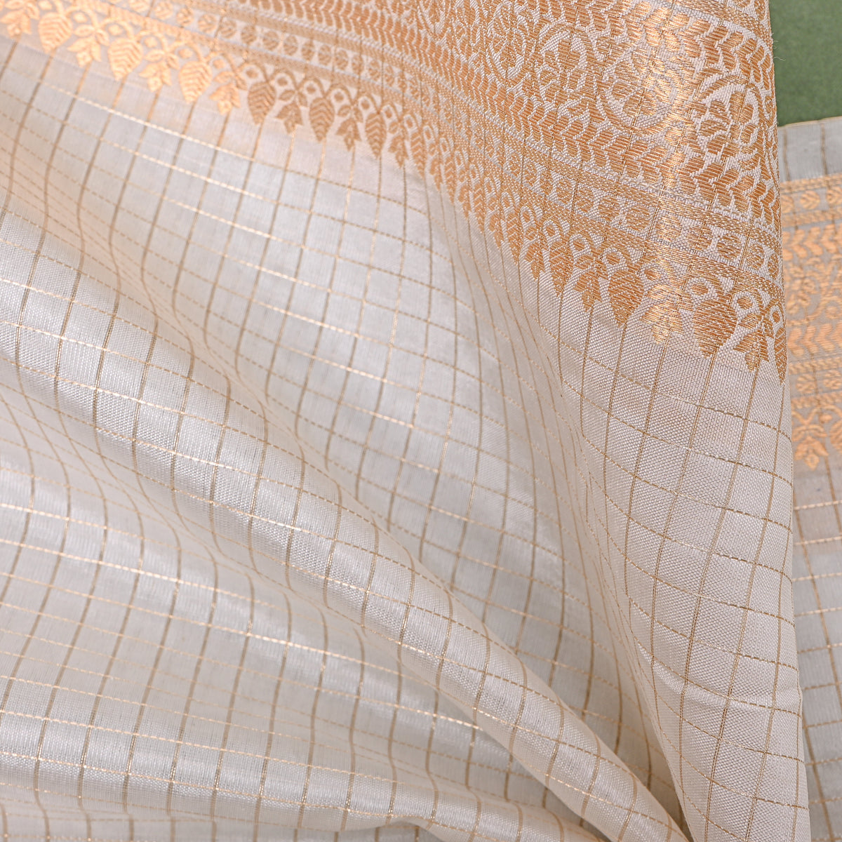 Snow White Jamawar Silk With Gold Zari Checks And Floral Border