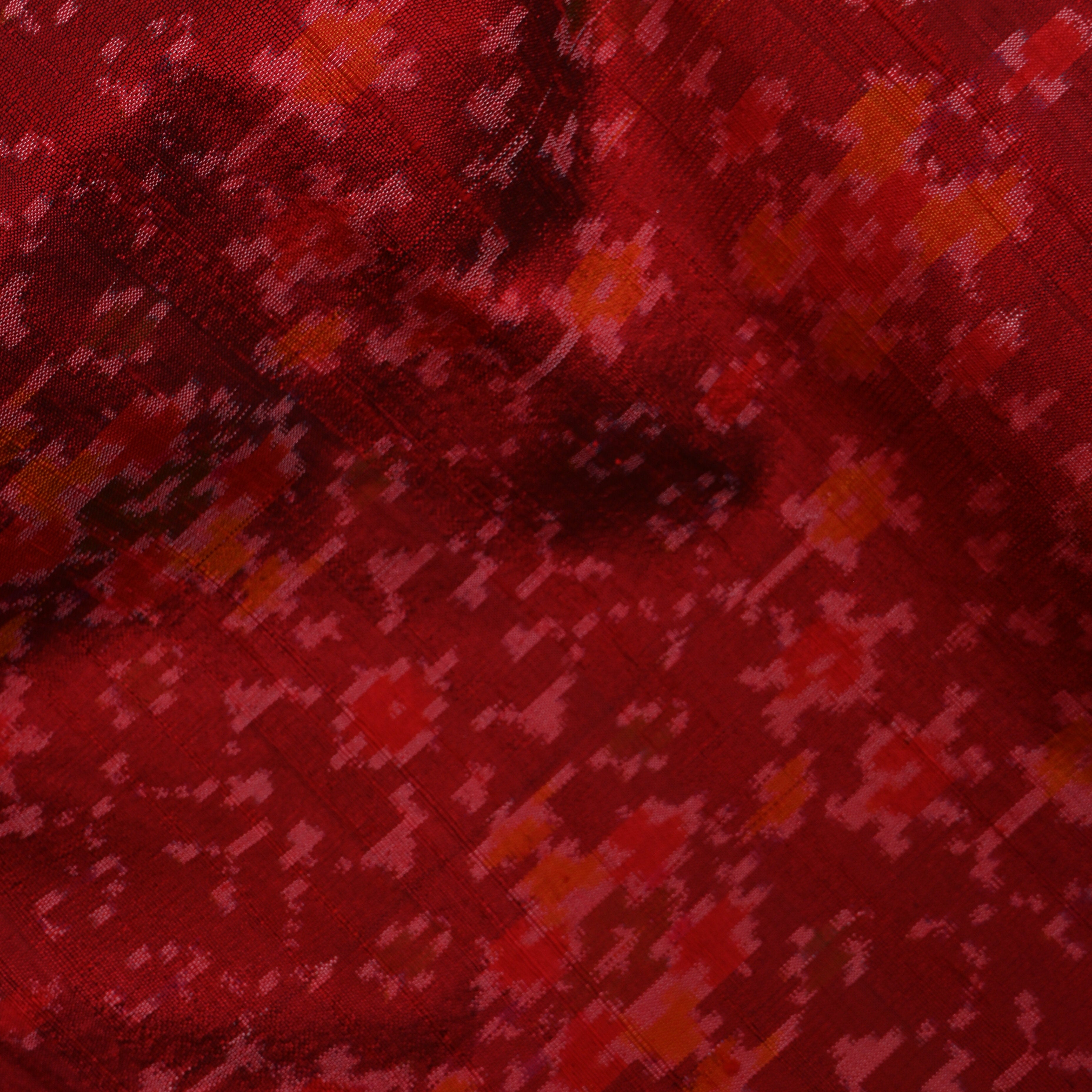 Rich Red Dupion Silk With Dense Ikat Weave Pattern