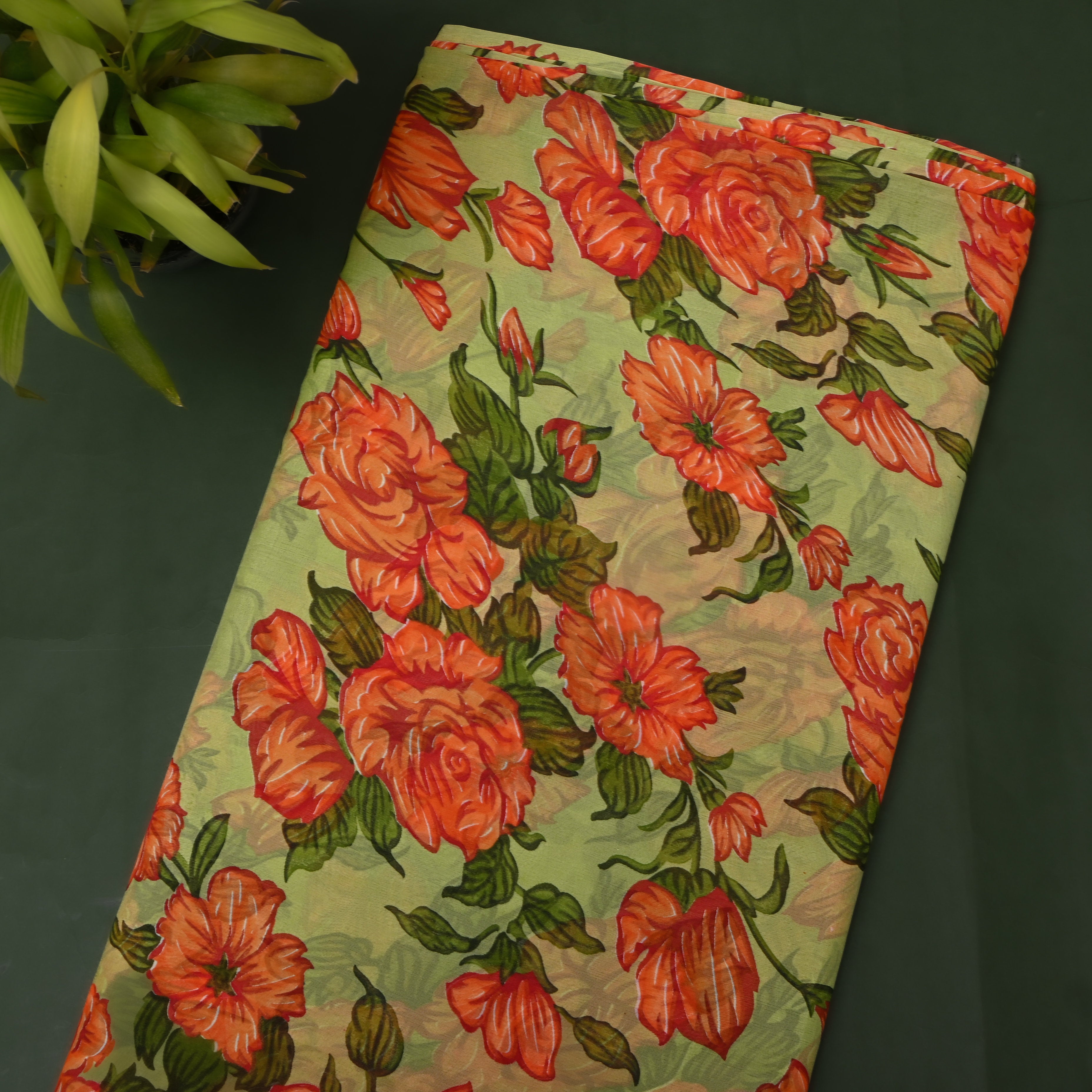 Pistachio Green Chiffon Printed Fabric With Coral Orange Floral Design