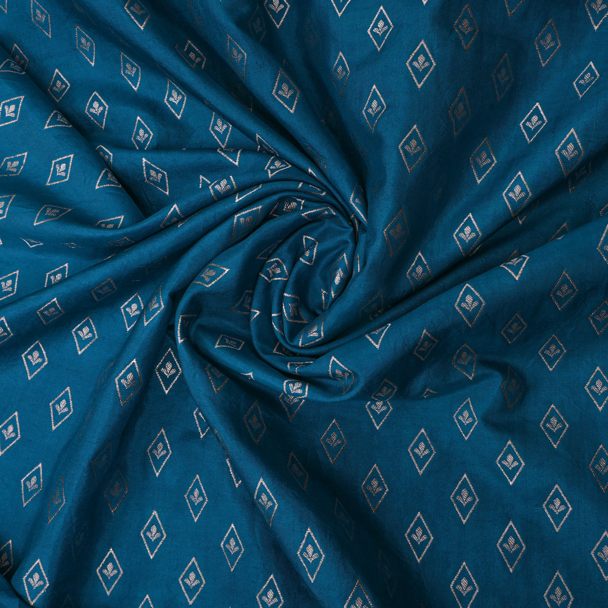 Peacock Teal Banarasi Silk With Silver Zari Butti.