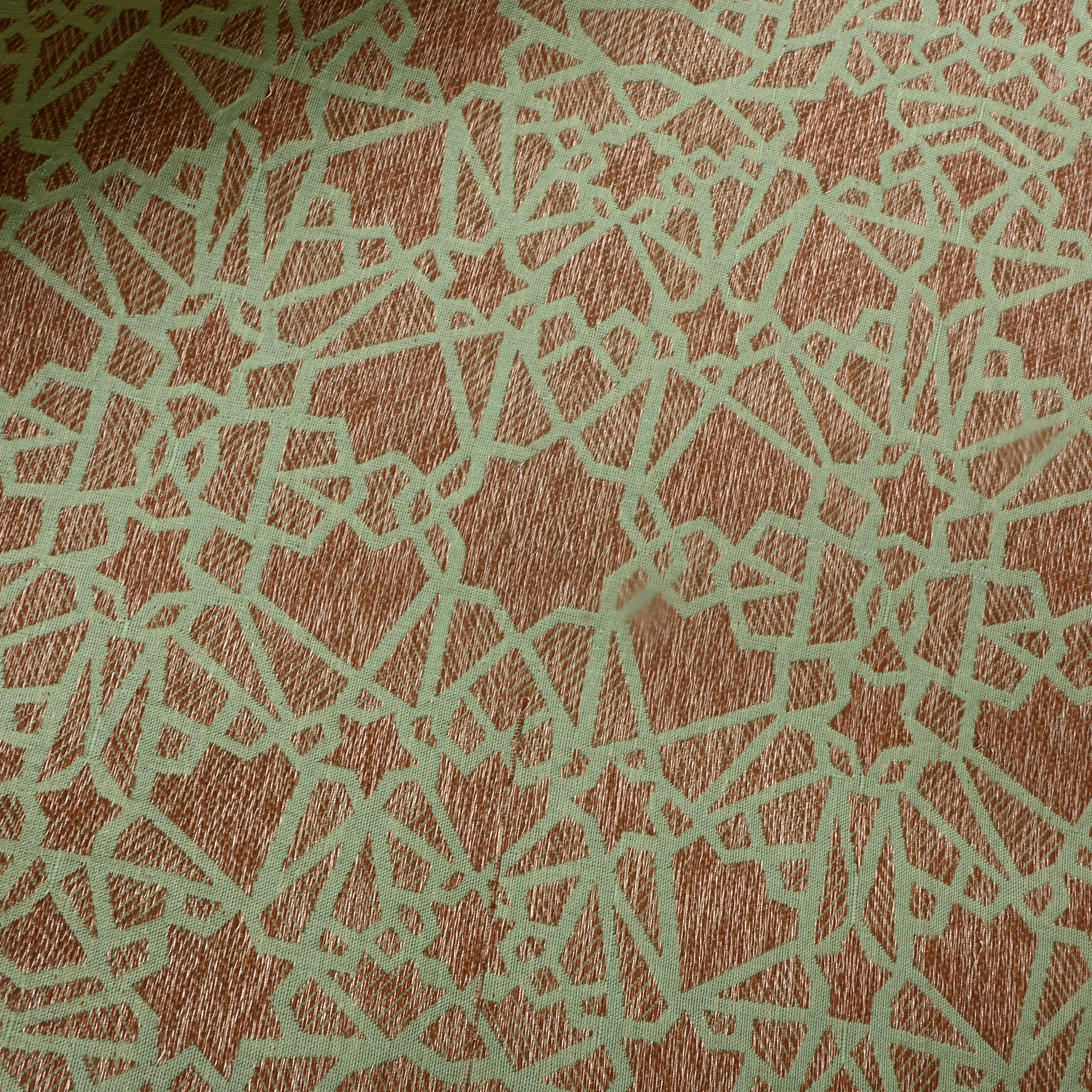 Pista Green Brocade Fabric With Abstract Pattern