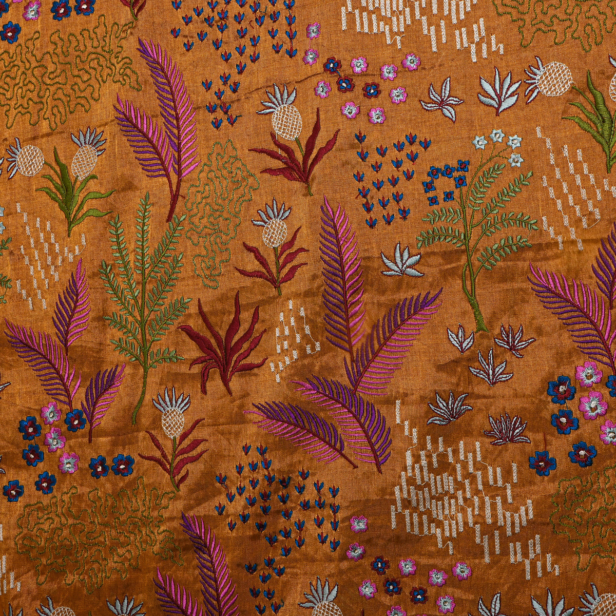 A Dark Rust Orange With Colourful Floral Thread Work Thissue Fabric