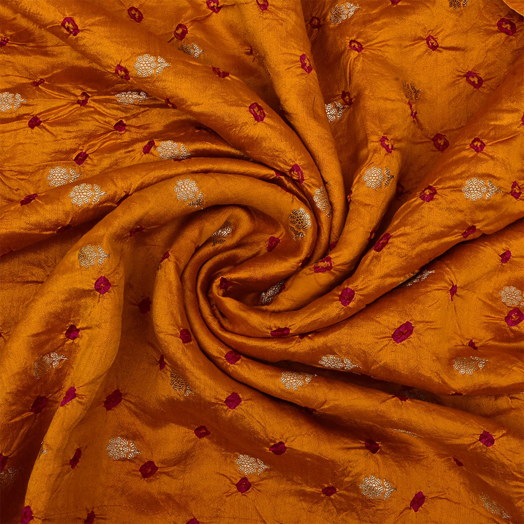 Rusty Orange Silk Bandhani Fabric With Floral Motifs