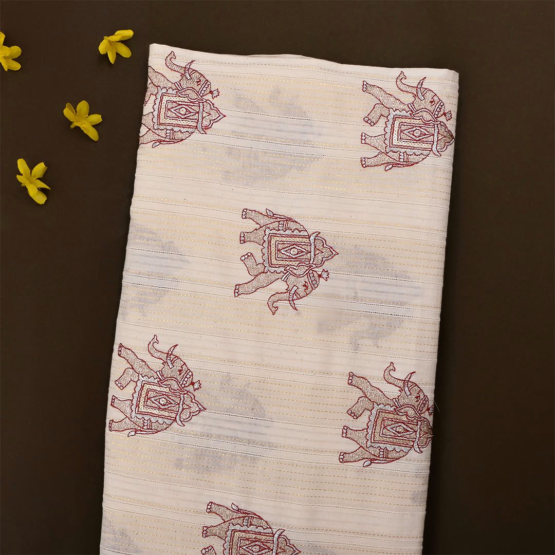 Soft Amber Cotton Embroidered Fabric With Elephant Motifs