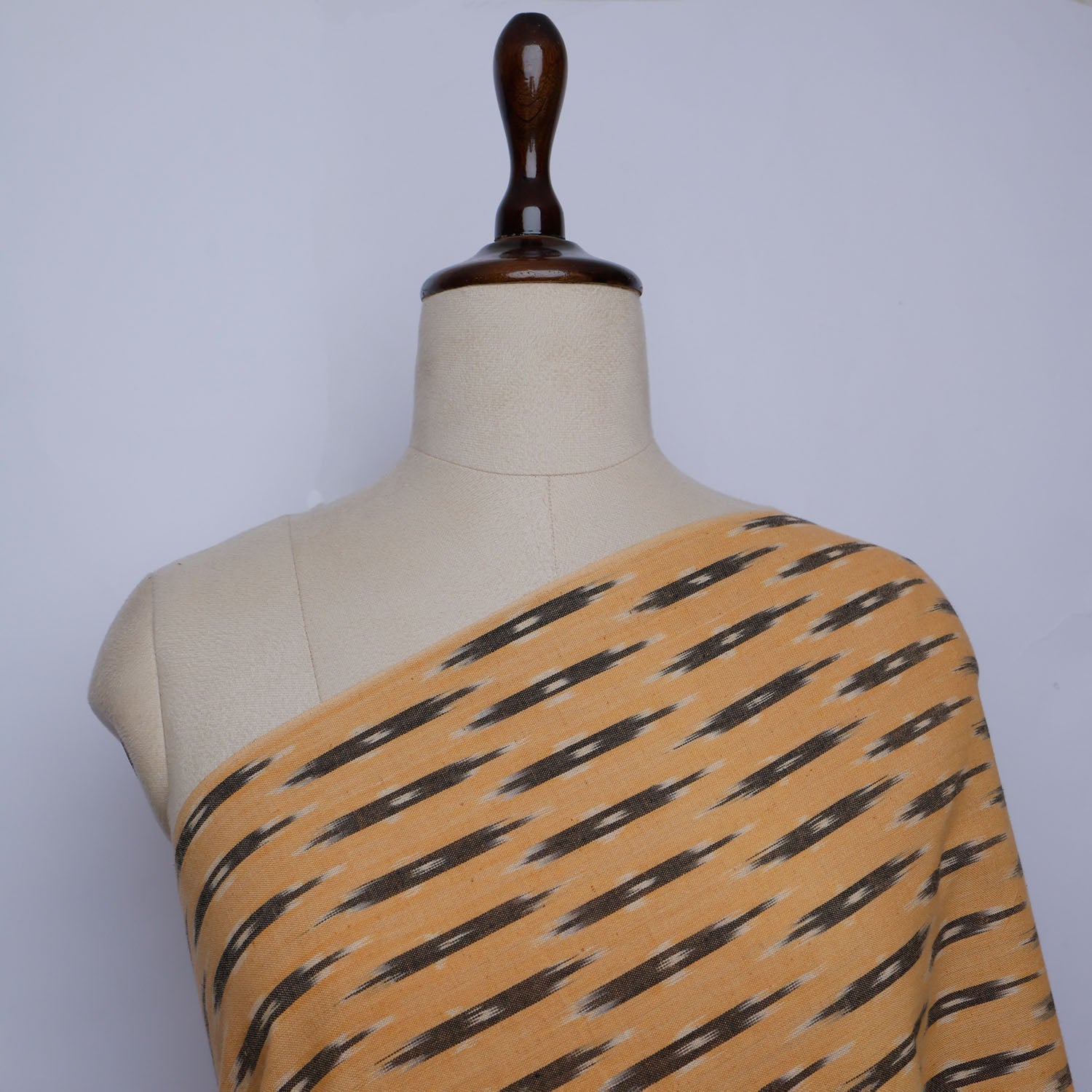 Yellow Orange Color Cotton Fabric With Ikkat Pattern