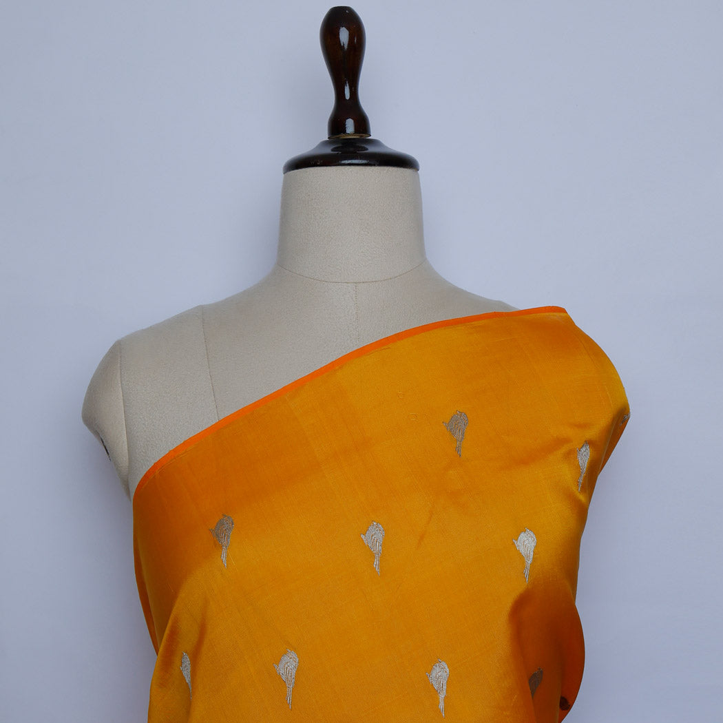 Orange Color Silk Fabric With Birds Motifs