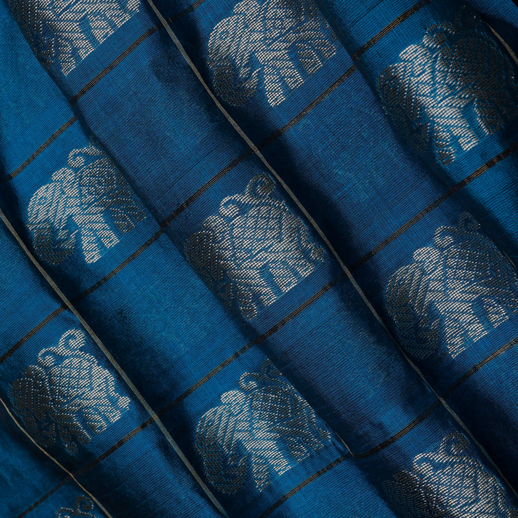 Azure Blue Color Silk Fabric With Yanai Motifs In Checks Pattern