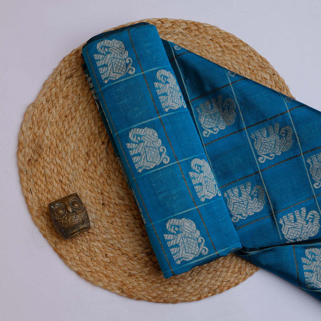 Azure Blue Color Silk Fabric With Yanai Motifs In Checks Pattern