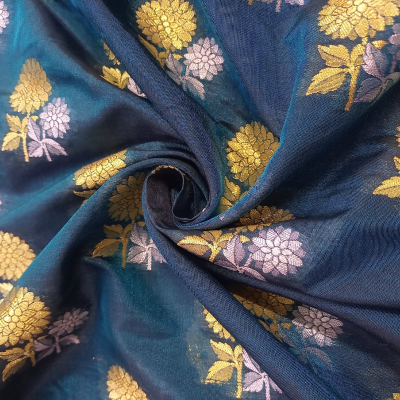 Drak Firozi Blue Color Silk Fabric With Floral Buttas