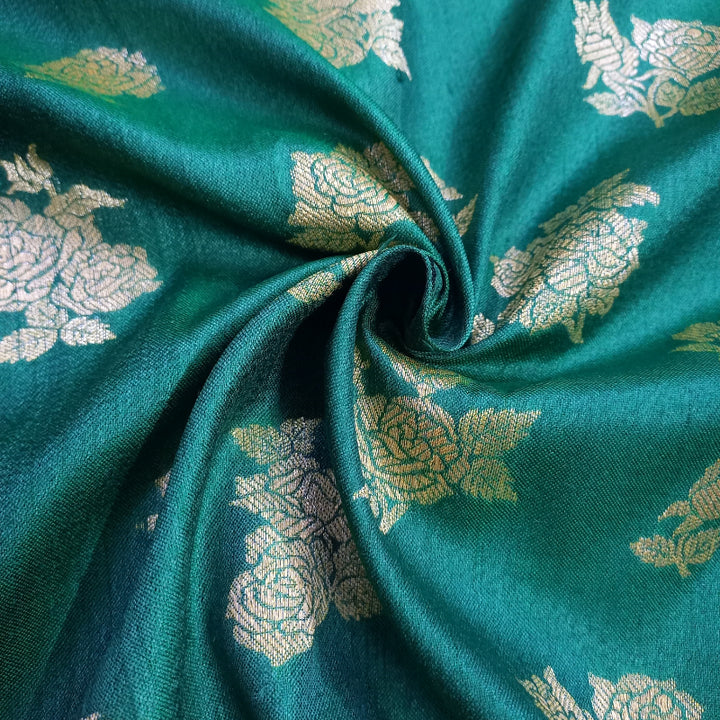 Teal Green Color Tussar Fabric With Floral Buttas