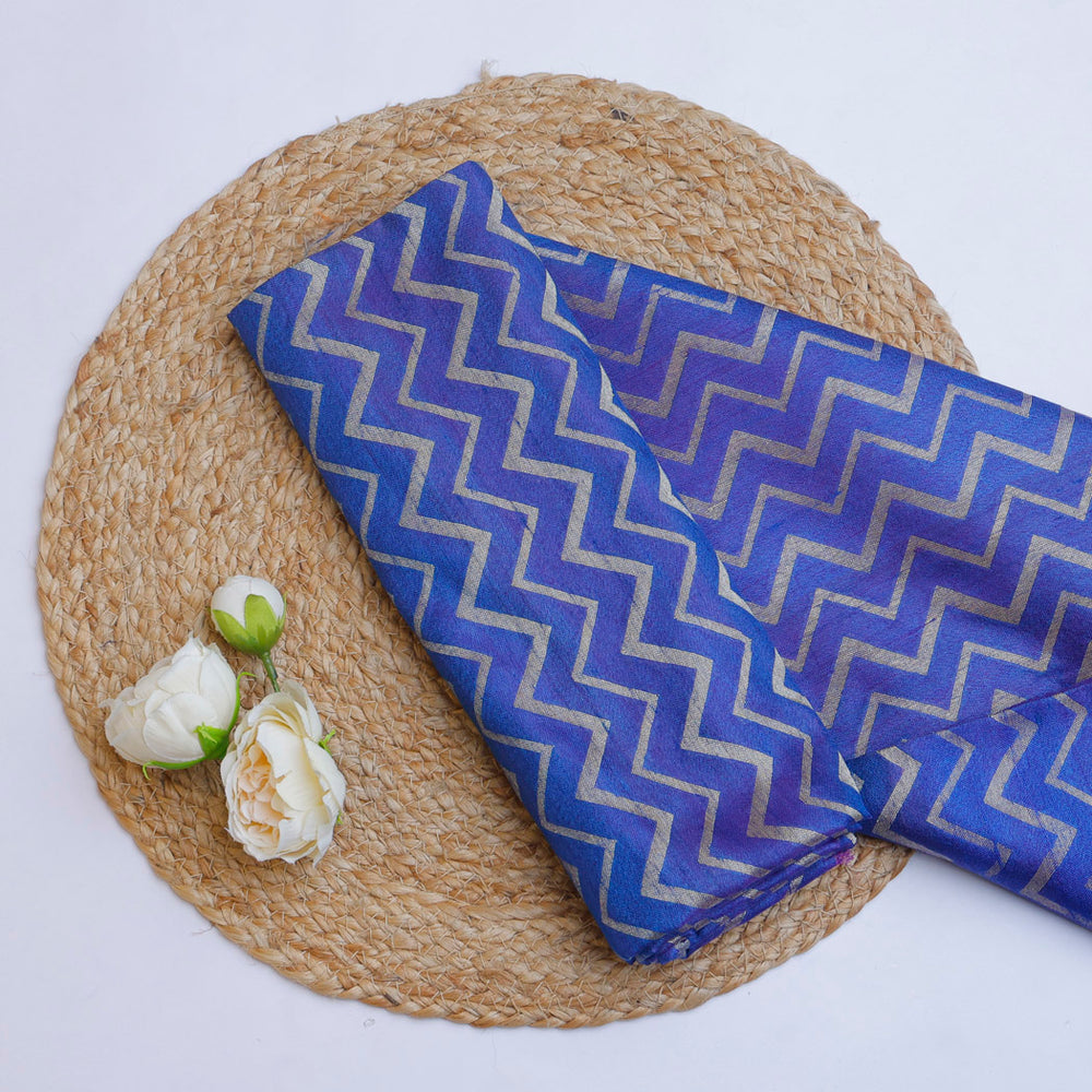 Azure Blue Color Tussar Fabric With Zig-Zag Pattern