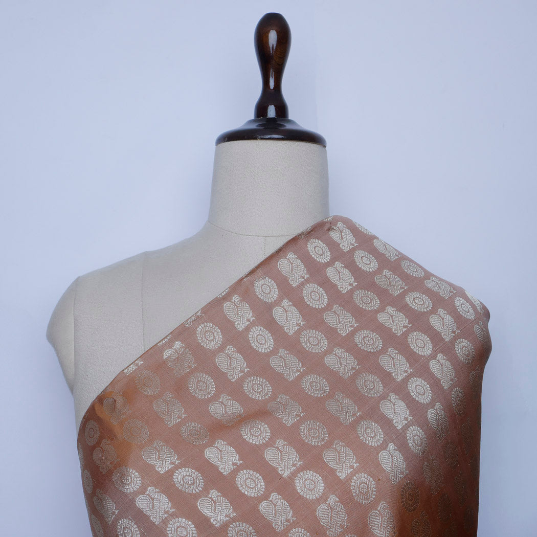 Pale Orange Color Silk Fabric With Floral And Mayil Buttis