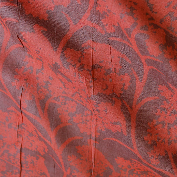 Orange Color Tussar Fabric With Floral Motif Pattern