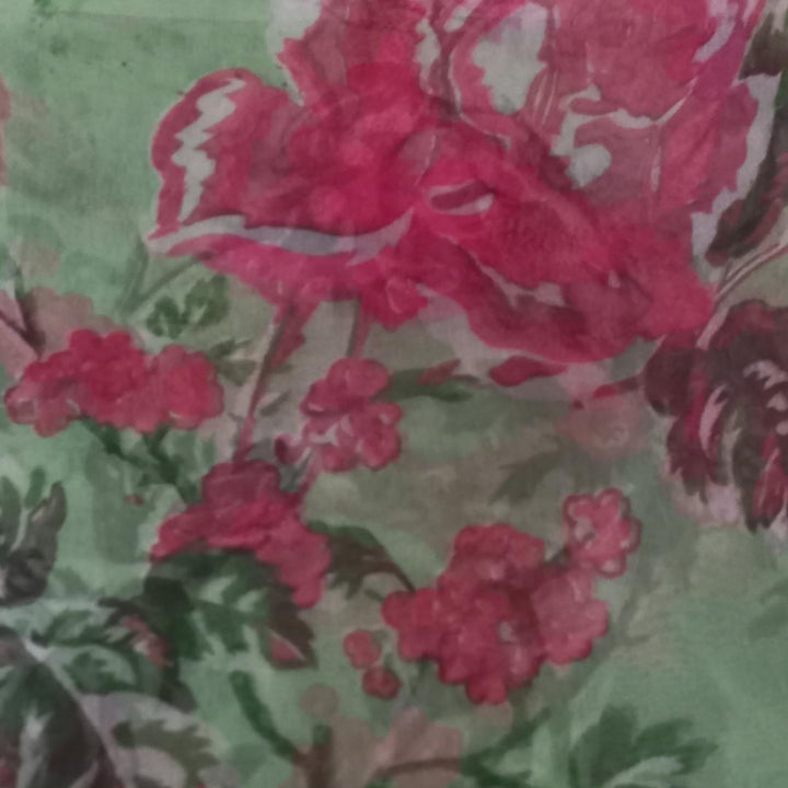 Pastel Green Color Silk Fabric With Floral Printed Motifs