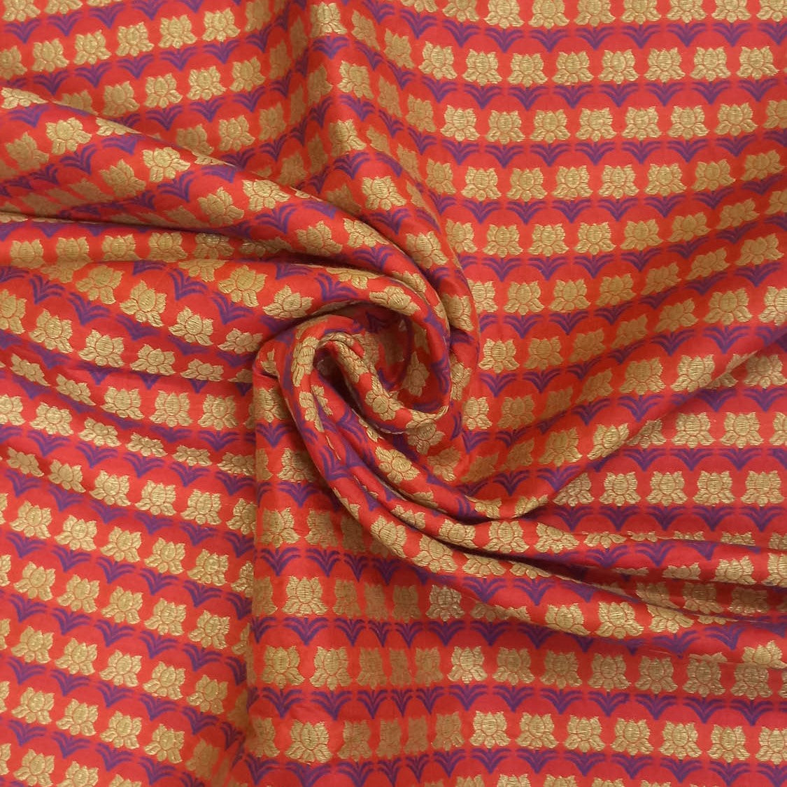 Orange Color Silk Fabric With Floral Motifs