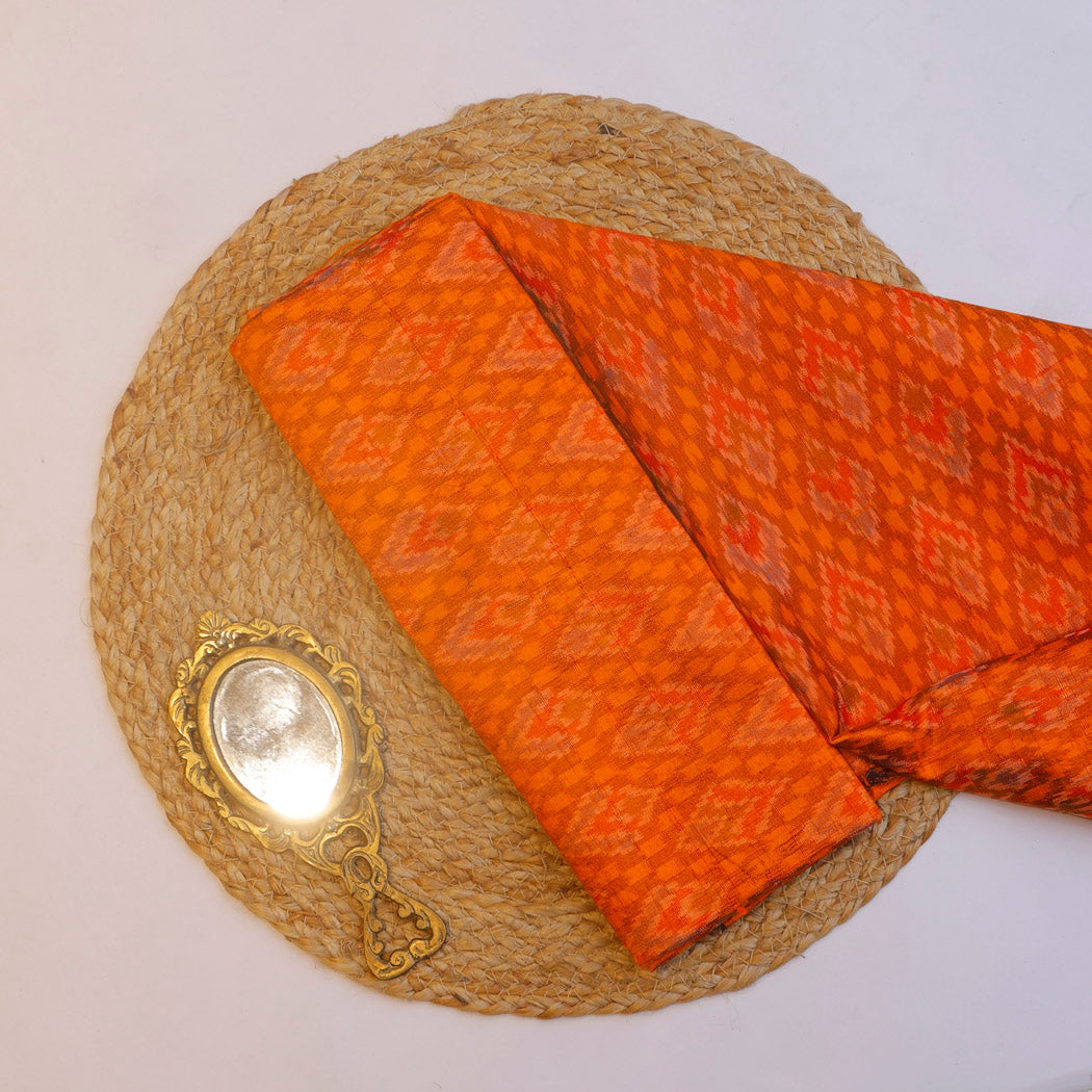 Bright Orange Color Dupion Silk Fabric With Ikat Design