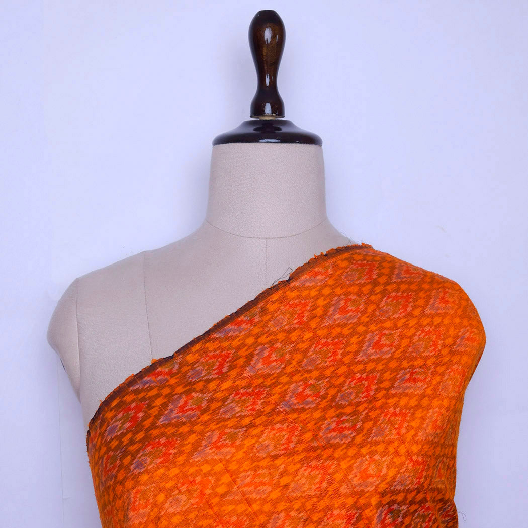 Bright Orange Color Dupion Silk Fabric With Ikat Design