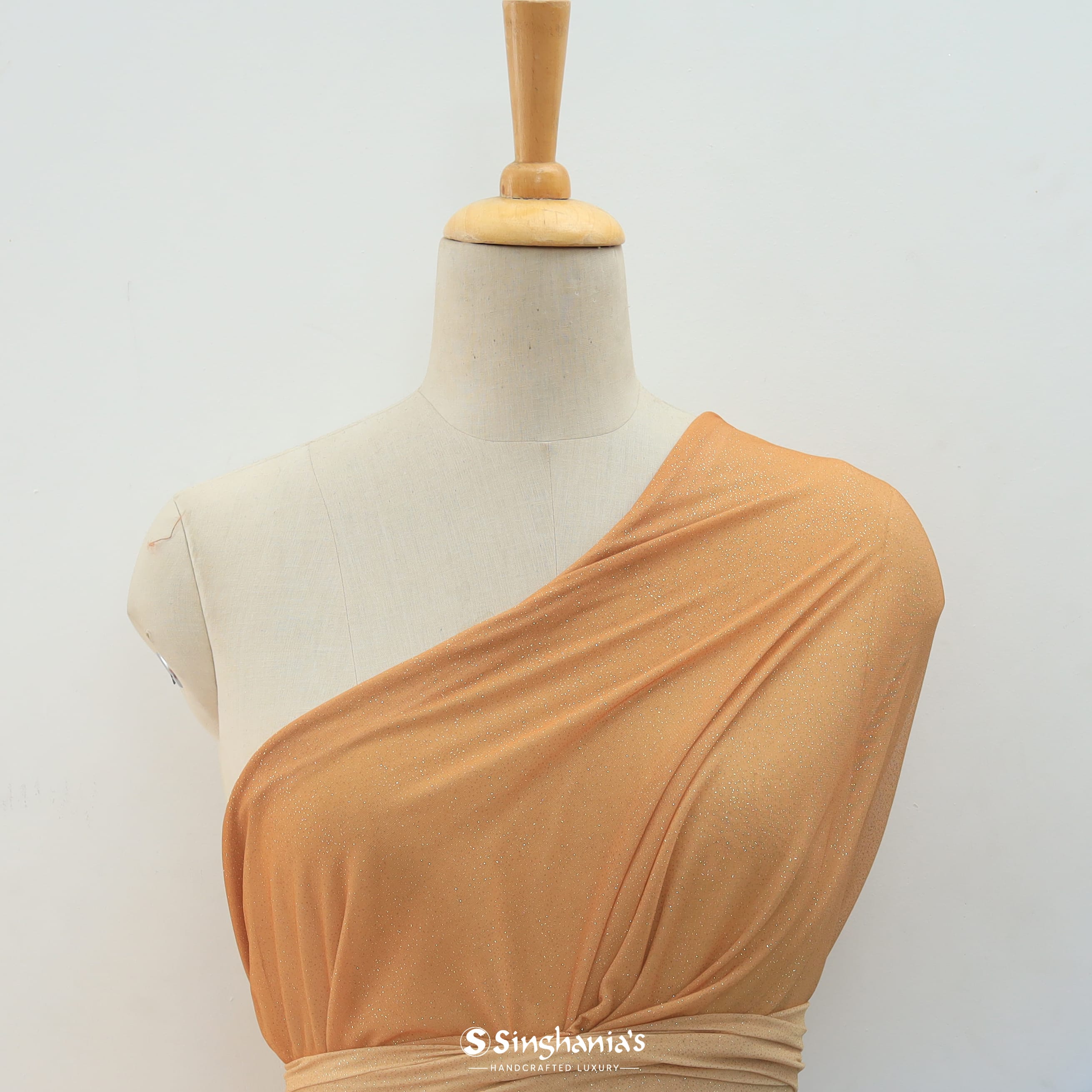 Light Orange Colour Metallic Sheer Knit Fabric