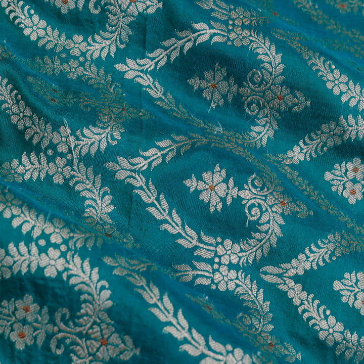 Teal Blue Color Silk Fabric With Floral Buttas