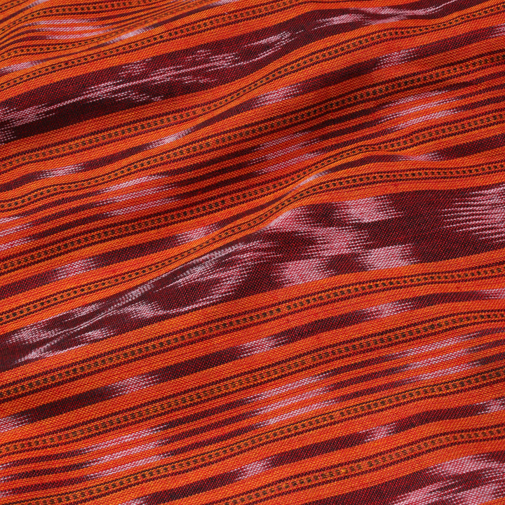 Tiger Orange Color Cotton Fabric With Ikkat Pattern