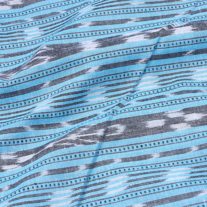 Sky Blue Color Cotton Fabric With Ikkat Pattern