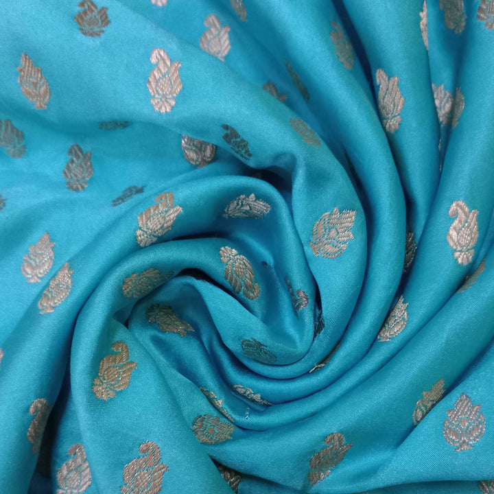 Light Blue Color Silk Fabric With Floral Buttis