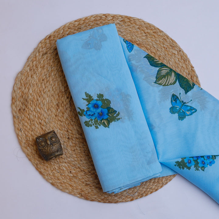 Maya Blue Color Chanderi Fabric With Floral Printed Motifs