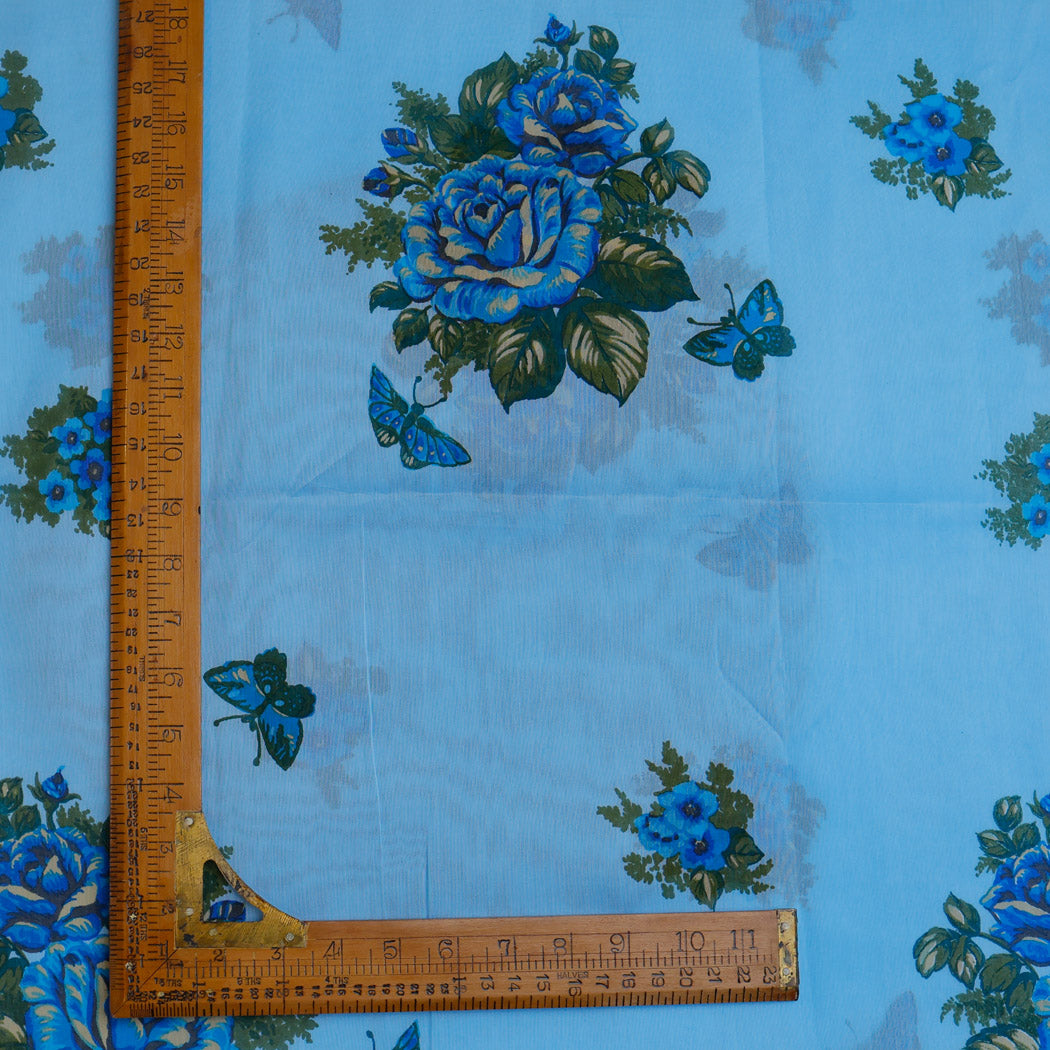 Maya Blue Color Chanderi Fabric With Floral Printed Motifs