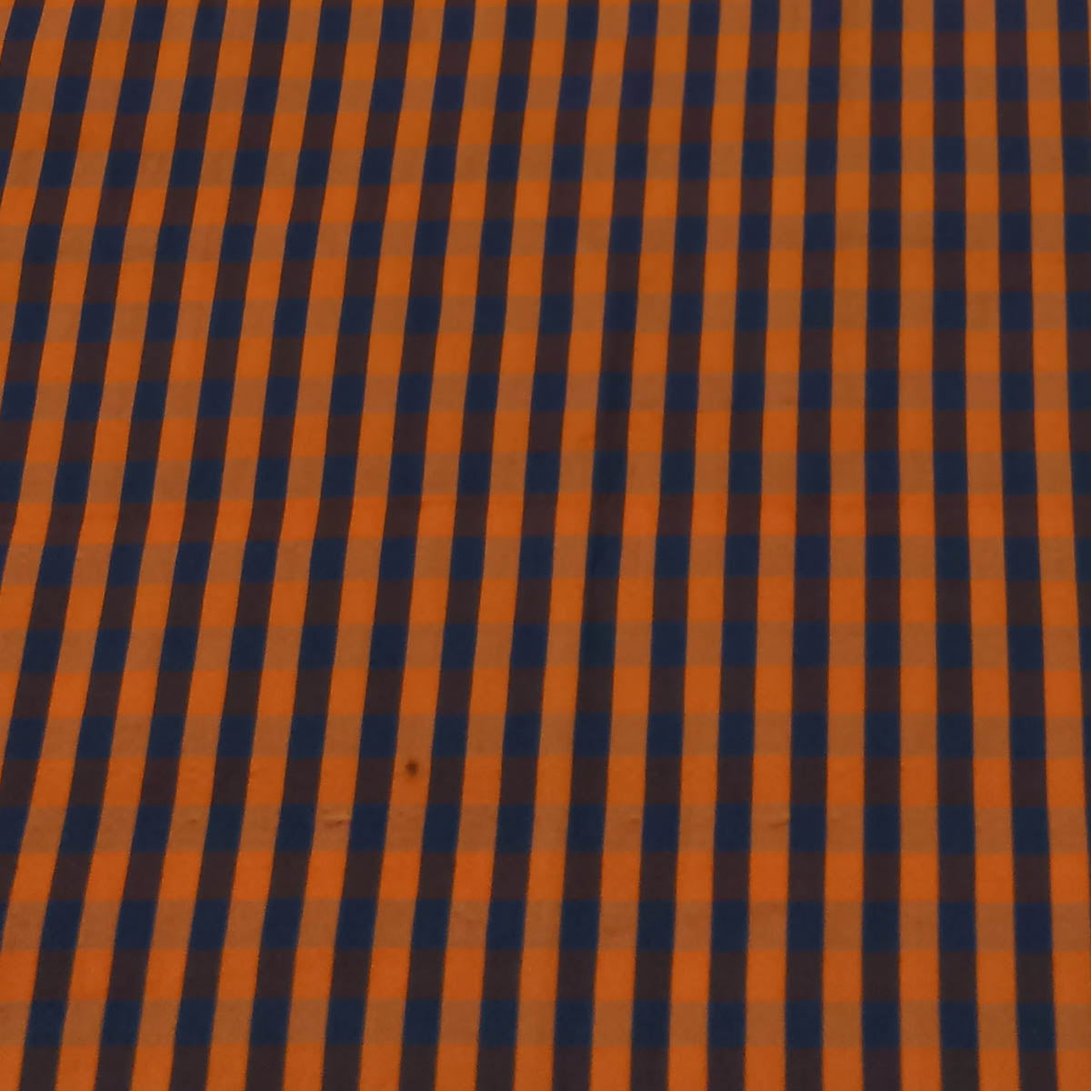 Orange Color Silk Fabric With Stripes Pattern In Black